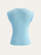 A light blue textured knit vest featuring shell buttons and detailed back stitching.