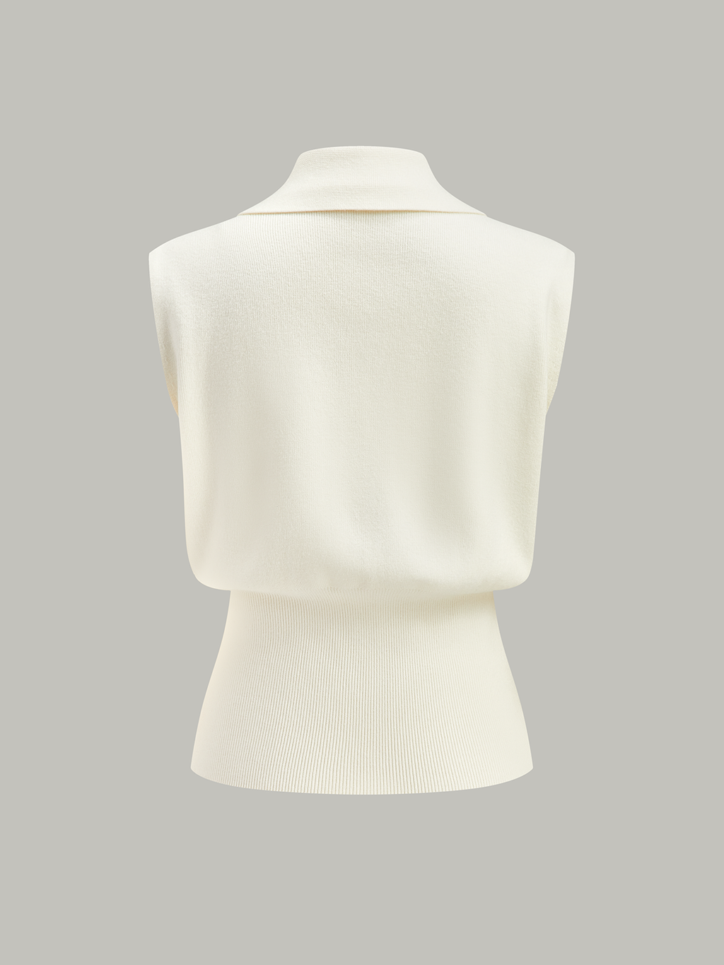 Sleeveless cream knitted vest with metallic buttons, collared, ribbed waist, textured knit detailing.
