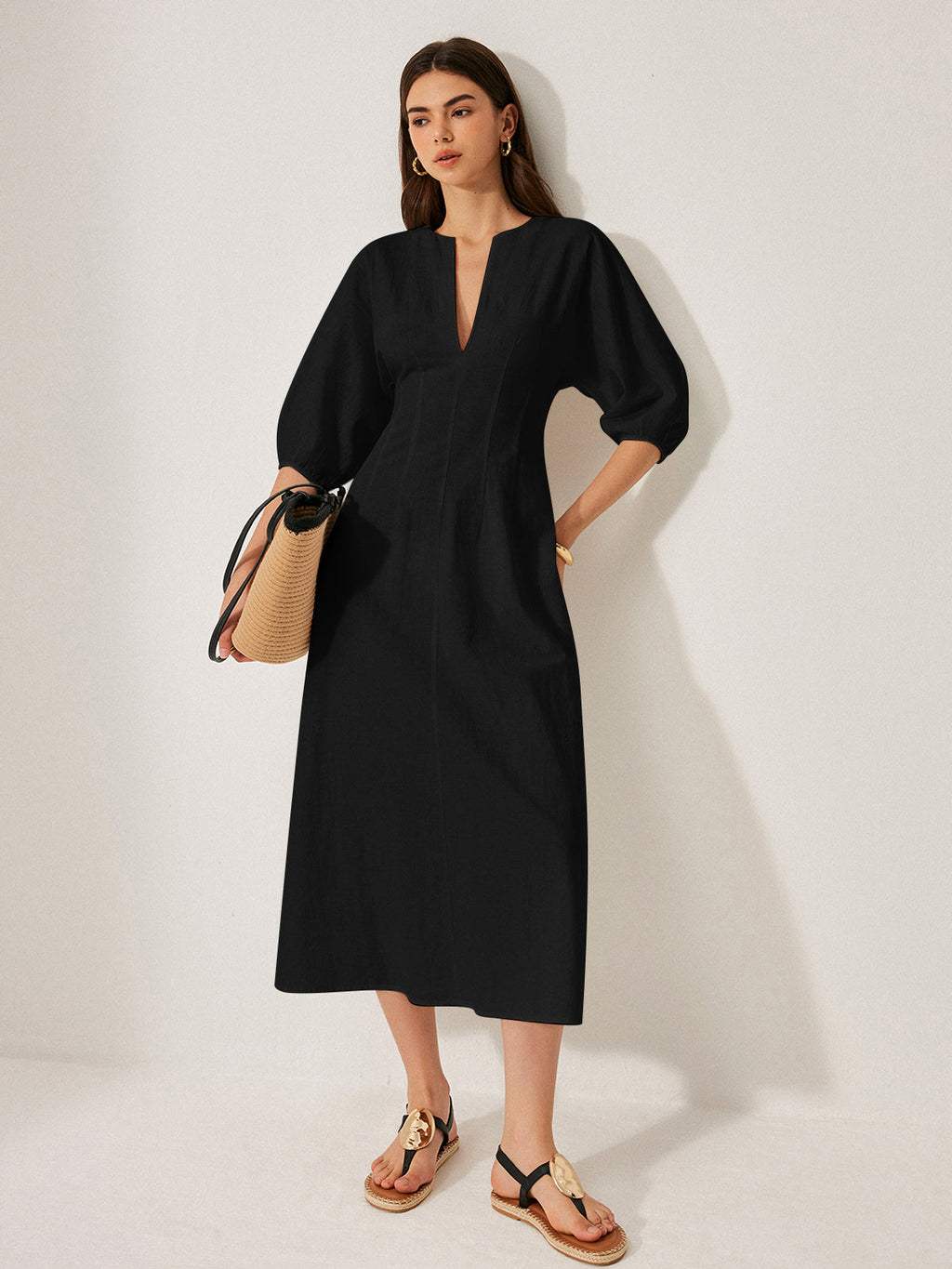 LA FINE FLEUR cotton and linen dress with puff sleeves in a relaxed, elegant style.