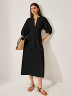 LA FINE FLEUR cotton and linen dress with puff sleeves in a relaxed, elegant style.