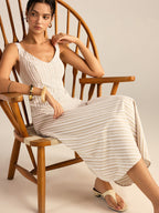 Striped asymmetrical hemline midi dress by LA FINE FLEUR in a neutral palette.
