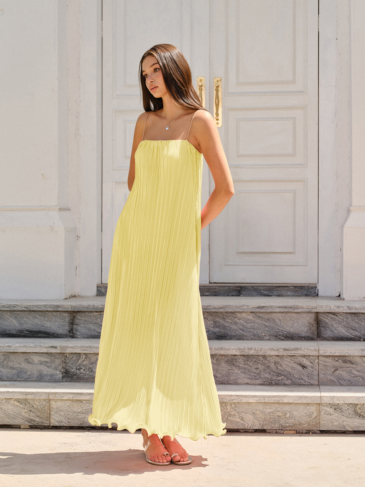 LA FINE FLEUR Spaghetti Strap Pleated Maxi Dress in a breezy, elegant silhouette.
