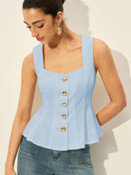 Light blue BYPINKYPARIS square neckline buttoned peplum blouse paired with classic blue jeans.