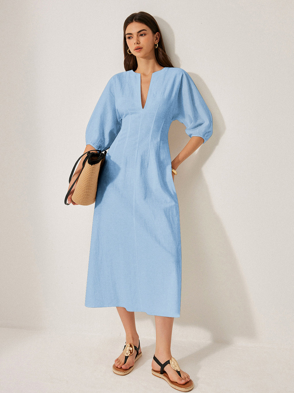 Light blue cotton and linen dress with puff sleeves from LA FINE FLEUR.