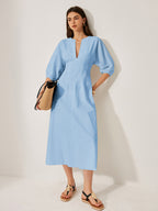 Light blue cotton and linen dress with puff sleeves from LA FINE FLEUR.