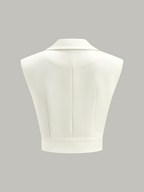 Off-white wide-cut cropped blazer vest featuring a cinched waist, tailored collar, and wide hem.