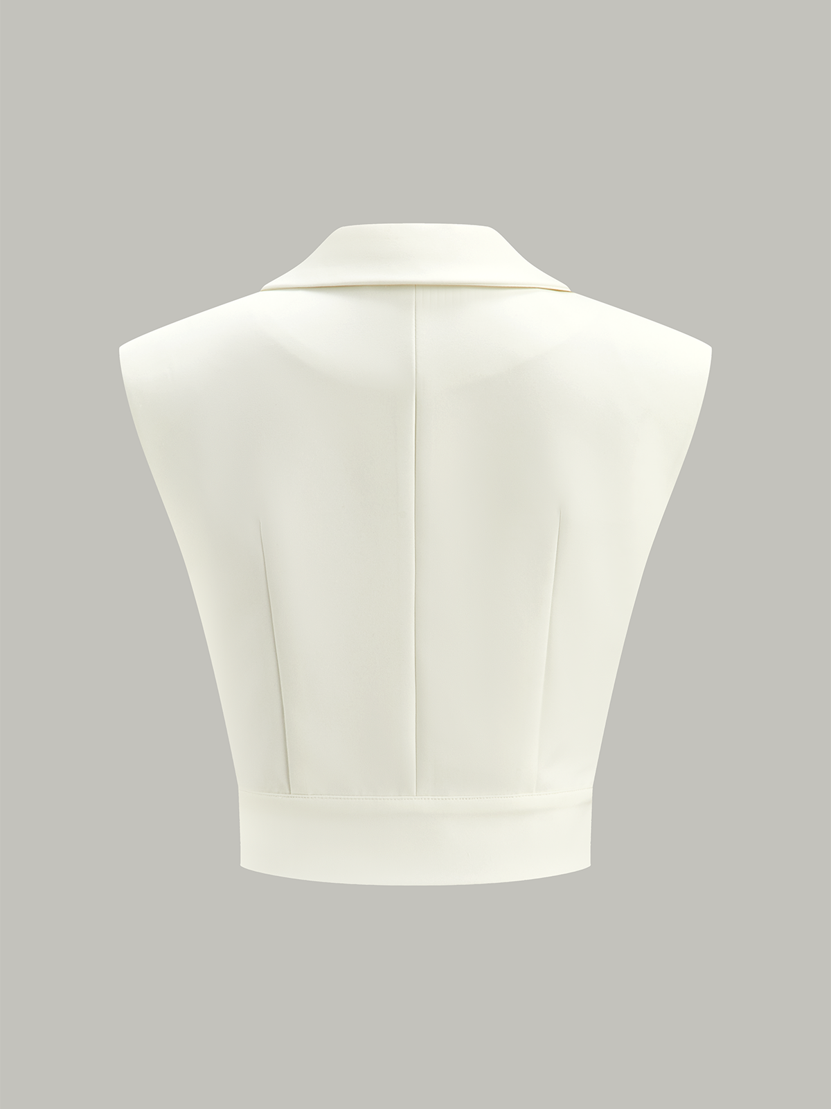 Off-white wide-cut cropped blazer vest featuring a cinched waist, tailored collar, and wide hem.