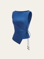 Blue sleeveless asymmetric top with side wrap-tie and decorative beaded string ends.