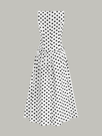 White sleeveless midi dress with a fitted bodice, flared skirt, and bold black polka dots.