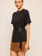 LA FINE FLEUR Short-Sleeve Top with Belt Detail and gold buckle, brown suede mini skirt.