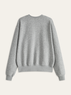 A plain light grey crew neck sweatshirt with long sleeves, ribbed cuffs, and waistband.