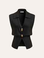 Sleeveless black knitted vest with collar and two large metallic buttons on the front.