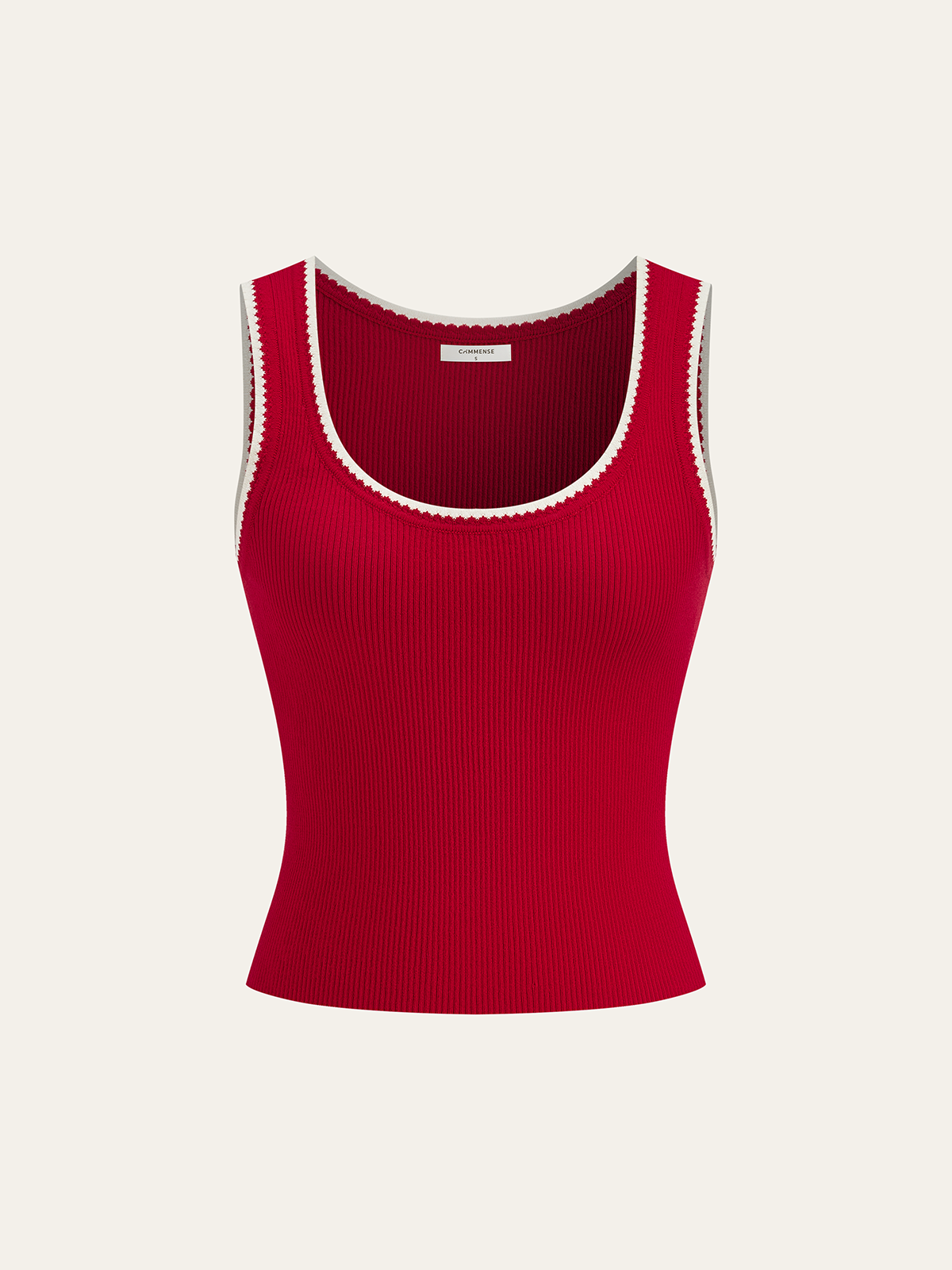 A fitted red ribbed knit tank top with white scalloped trim and scoop neckline.