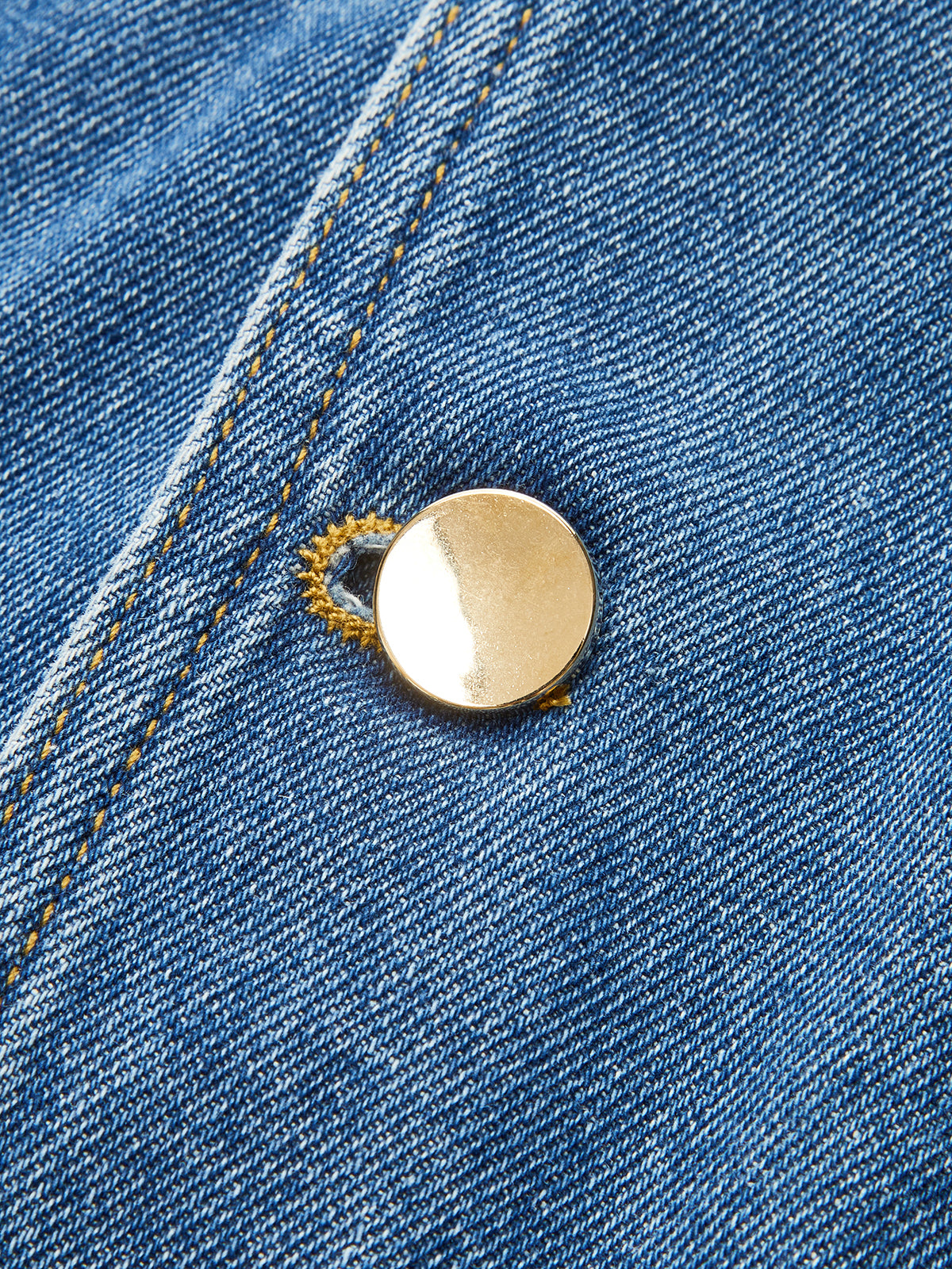 Classic Denim Vest by LA FINE FLEUR with gold button and yellow-stitched blue polyester denim.