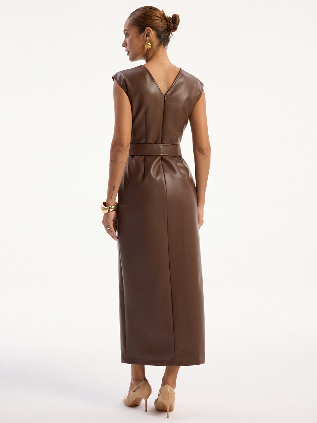 Brown faux leather sleeveless midi dress with belt, V-back, and a midi hem.
