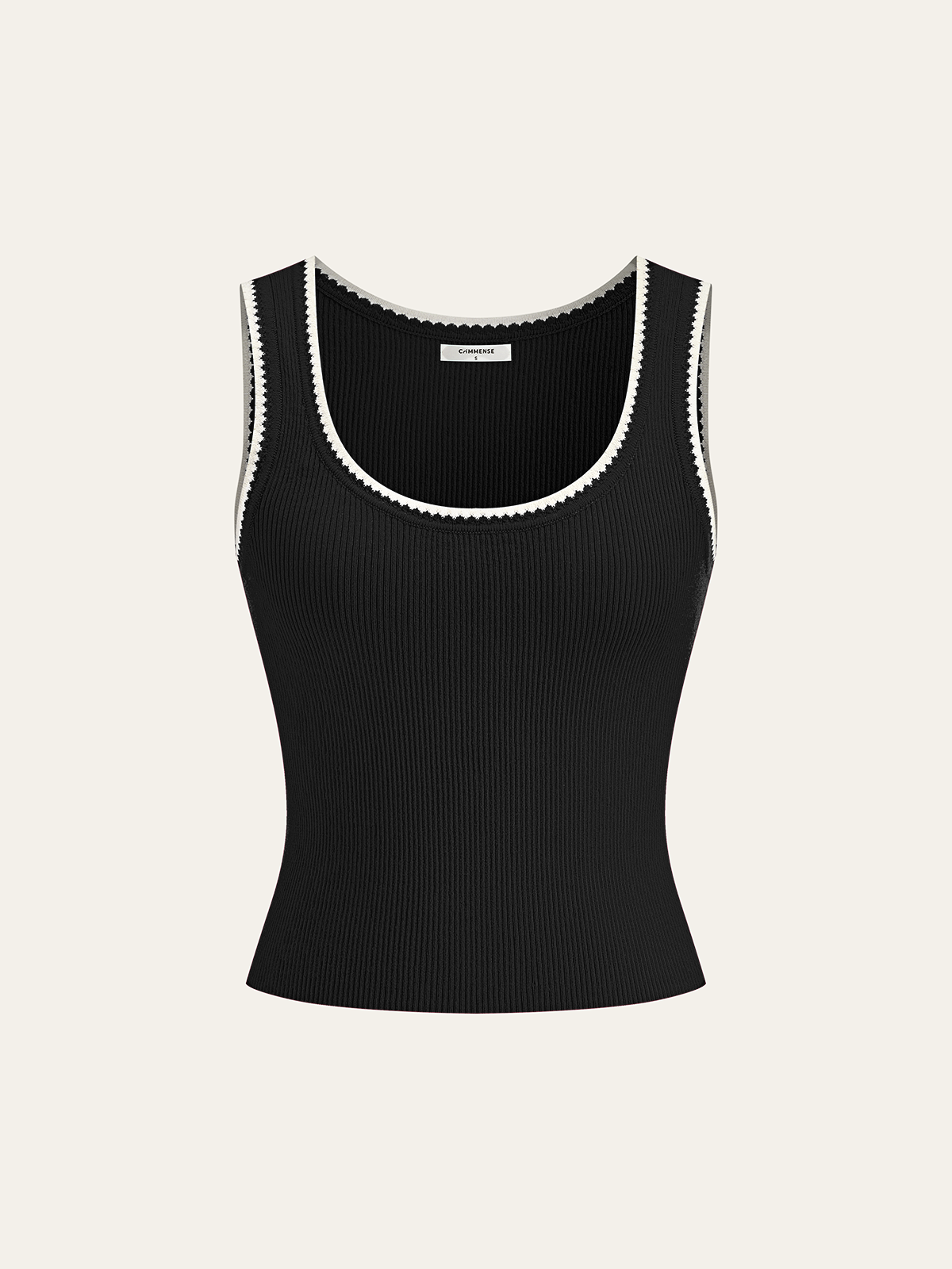 A black ribbed knit tank top with scalloped white trim at the neckline and armholes.