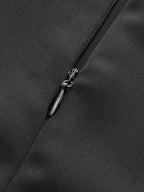 Close-up of black zipper on LA FINE FLEUR mock neck jumpsuit with wide legs.
