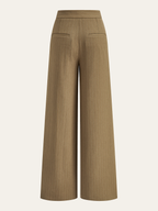 Brown striped wide-leg pleated trousers with subtle pleats and back welt pockets.