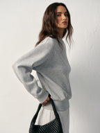 Grey LA FINE FLEUR cotton blend crew neck sweatshirt paired with matching grey sweatpants.