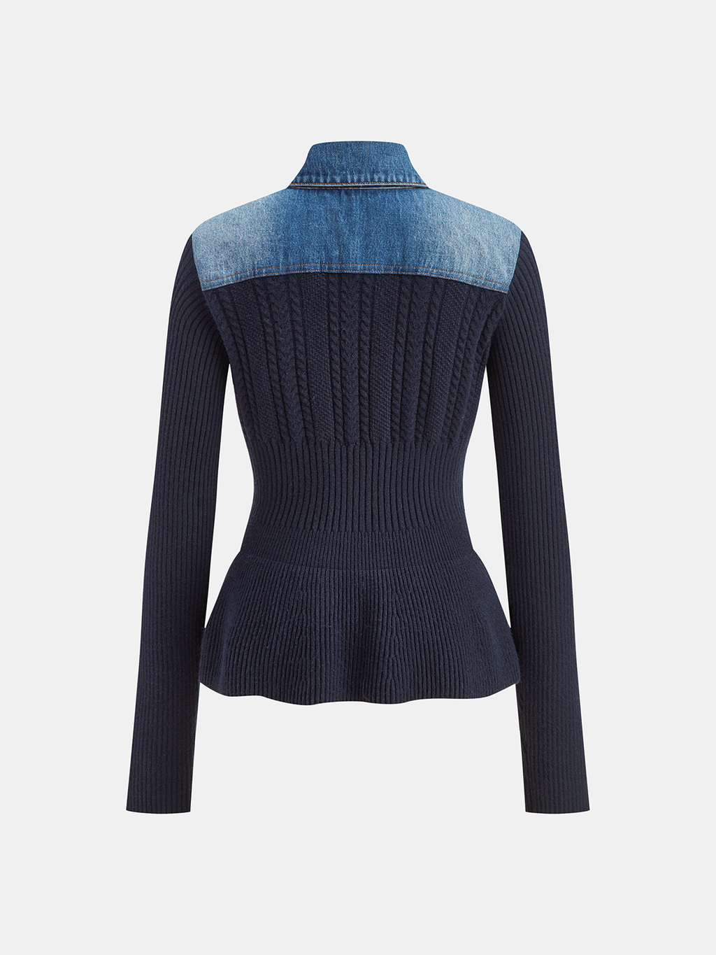Navy blue stretch knit cardigan with denim collar, peplum hem, and cable knit detailing.