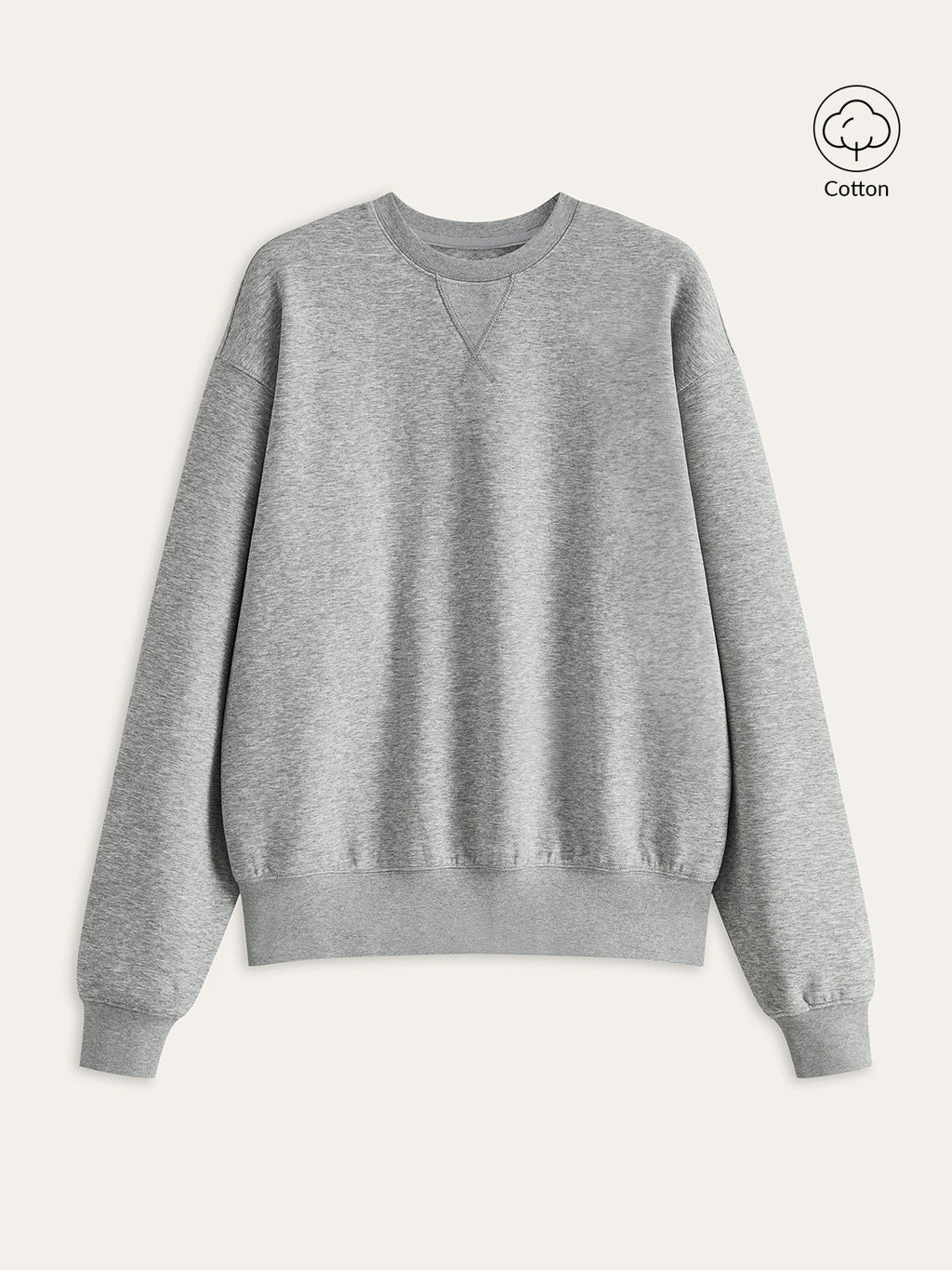 Light gray cotton blend crew neck sweatshirt with long sleeves, ribbed cuffs, and hem.