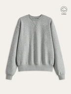 Light gray cotton blend crew neck sweatshirt with long sleeves, ribbed cuffs, and hem.