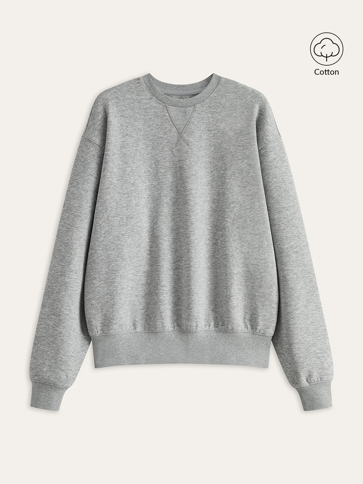 Light gray cotton blend crew neck sweatshirt with long sleeves, ribbed cuffs, and hem.