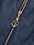 Gold zipper and pull detail on dark blue LA FINE FLEUR denim zip-front dress.