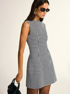 A LA FINE FLEUR chic houndstooth pattern sleeveless A-line mini dress is displayed.