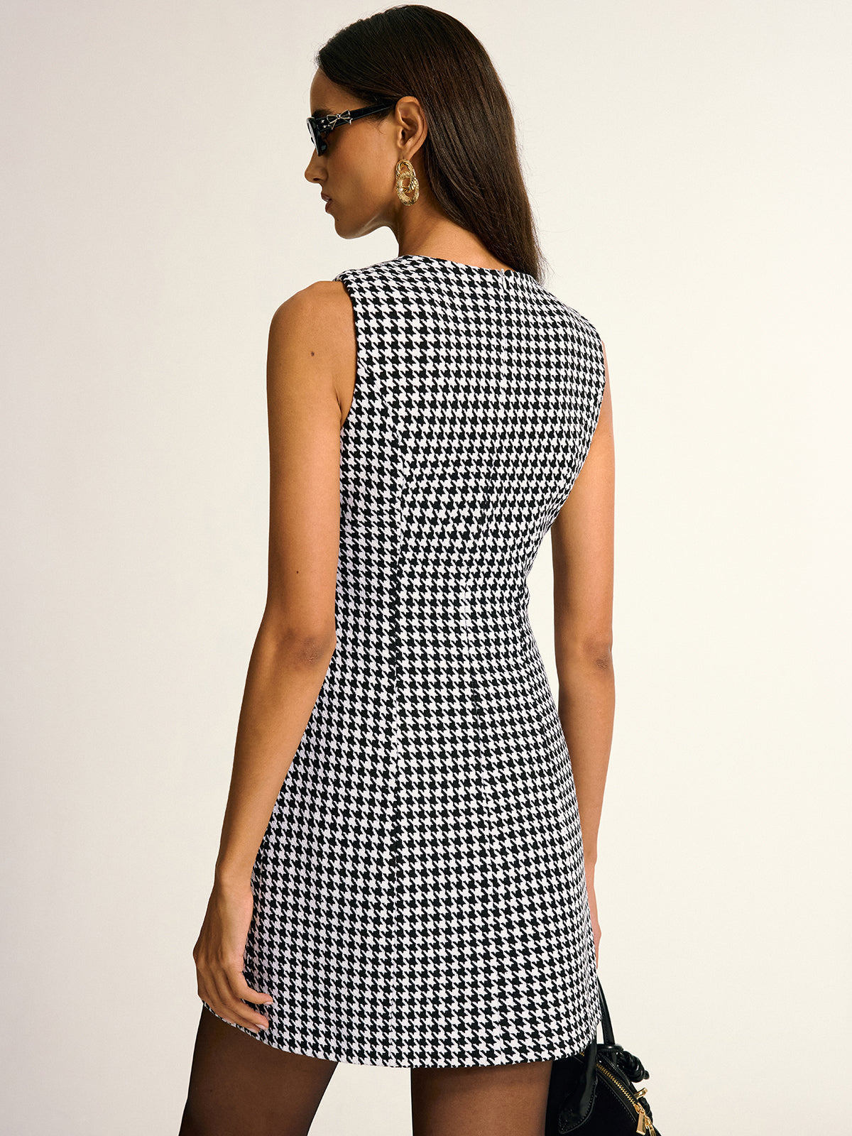 Sleeveless A-line mini dress in a chic houndstooth pattern from LA FINE FLEUR.