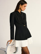 A tailored blazer dress in white with woven pleated accents and a single button.