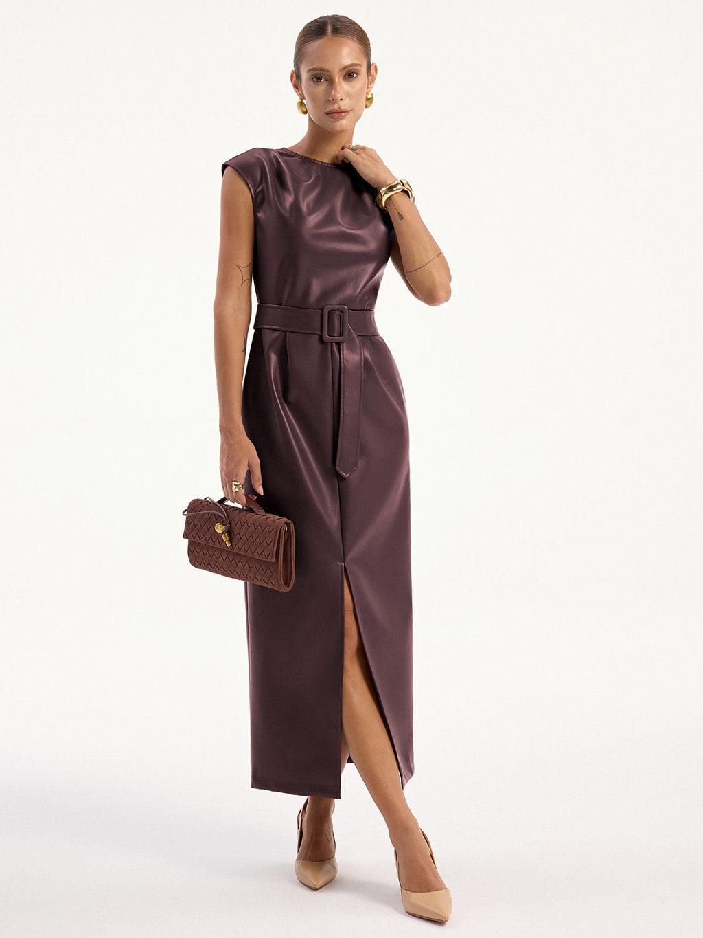 Sleeveless faux leather midi dress with a belt, fitted silhouette, and refined shine.