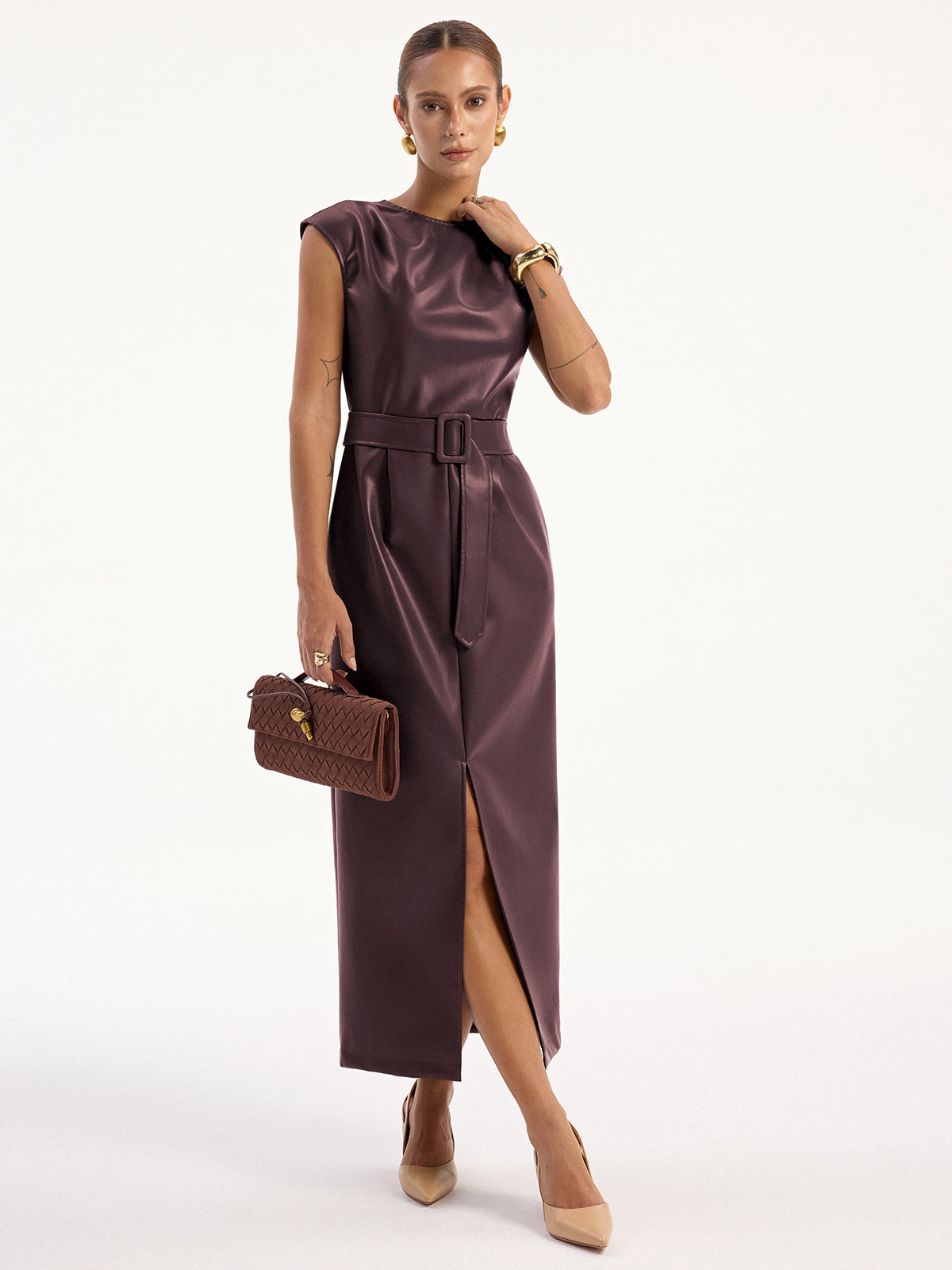 Sleeveless faux leather midi dress with a belt, fitted silhouette, and refined shine.