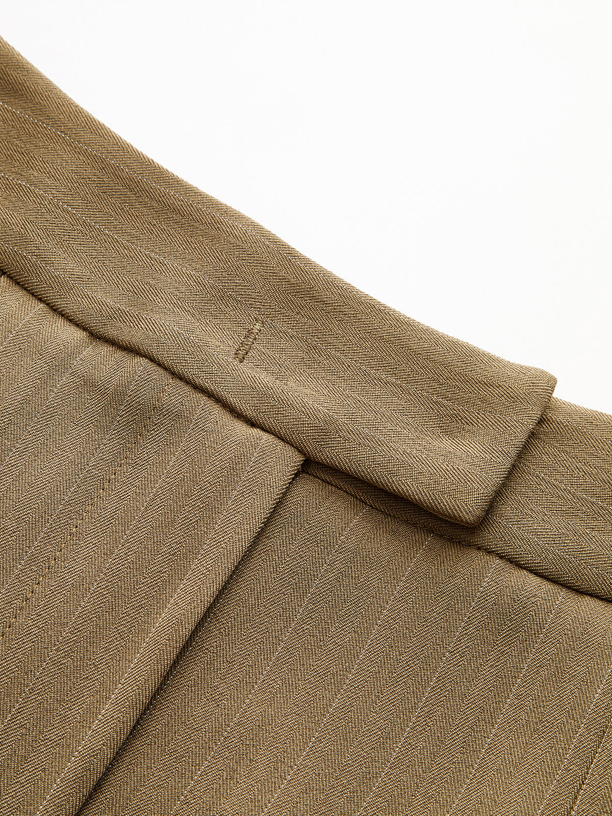 Striped pleated trousers with wide-leg cut, featuring detailed waistband stitching and textured fabric.