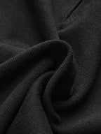 Sheer crew neck bodysuit with smooth, subtly ribbed texture, gentle folds, and wavy creases.