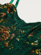 Dark green lace bustier corset bodysuit with brown and yellow floral embroidery.