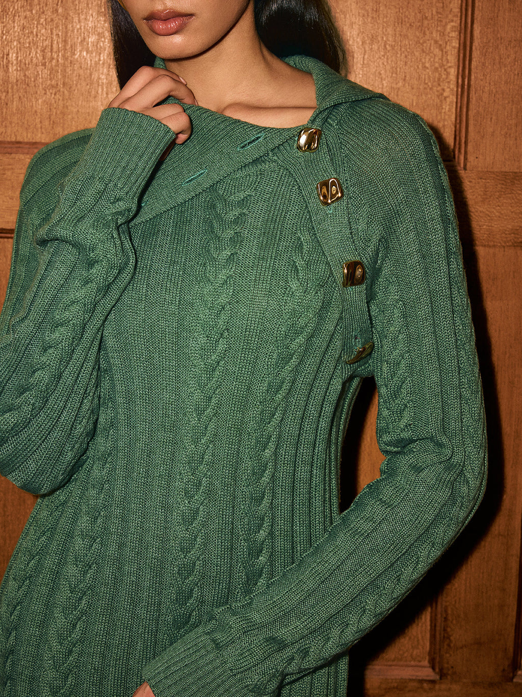 Green Asymmetric Collar Sweater Dress with cable knit detail and gold collar buttons.