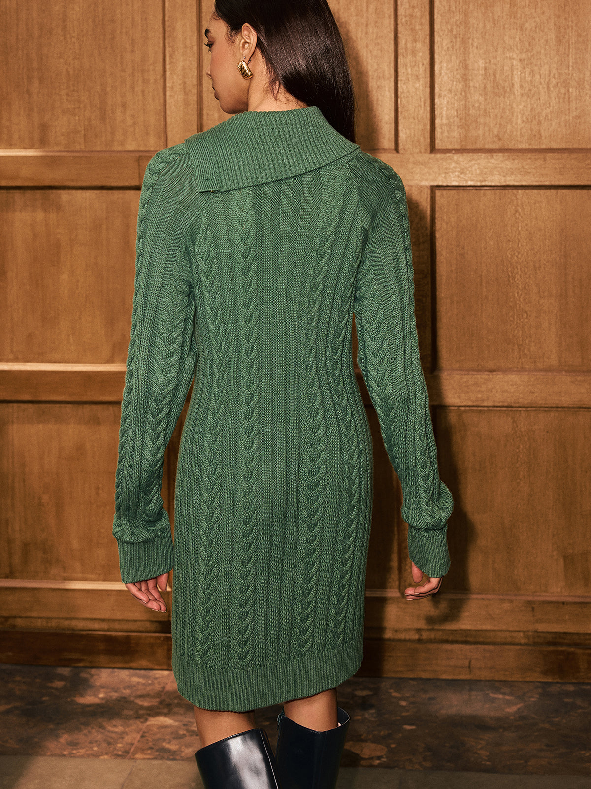 LA FINE FLEUR's green Asymmetric Collar Sweater Dress with cable knit detail.