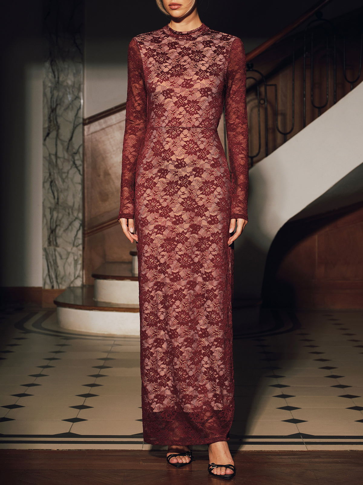 LA FINE FLEUR Elegant Lace Backless Maxi Dress with long sleeves and intricate lace detailing.