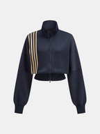Navy blue cropped athletic sweatshirt with four beige stripes, stand collar, and front zipper.