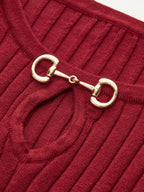 Bell sleeve midi dress in ribbed red knit with mermaid hem and gold horsebit detail.