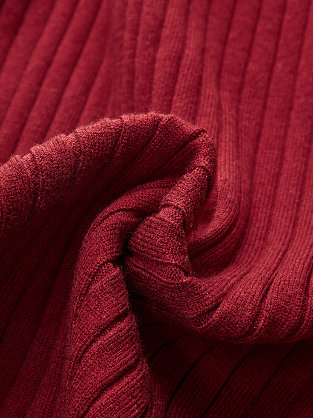 Textured, ribbed knit fabric on LA FINE FLEUR midi dress with horsebit detail and mermaid hem.