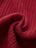 Textured, ribbed knit fabric on LA FINE FLEUR midi dress with horsebit detail and mermaid hem.