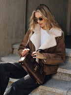 LA FINE FLEUR Stylish Lapel Coat with Cozy Fleece Lining, white tee, and dark jeans.