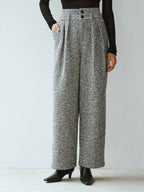 LA FINE FLEUR Double Waistband Wool Blend Tweed Trousers, black long-sleeve top, black heeled shoes.
