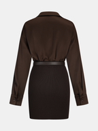 A dark brown, long-sleeve ribbed knit shirt dress with a belted panel detail.