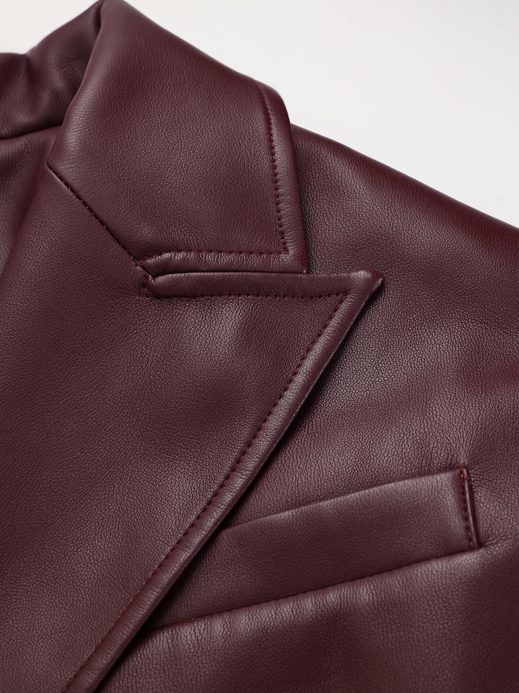 Faux Leather Jacket with Belt and Lapel Design