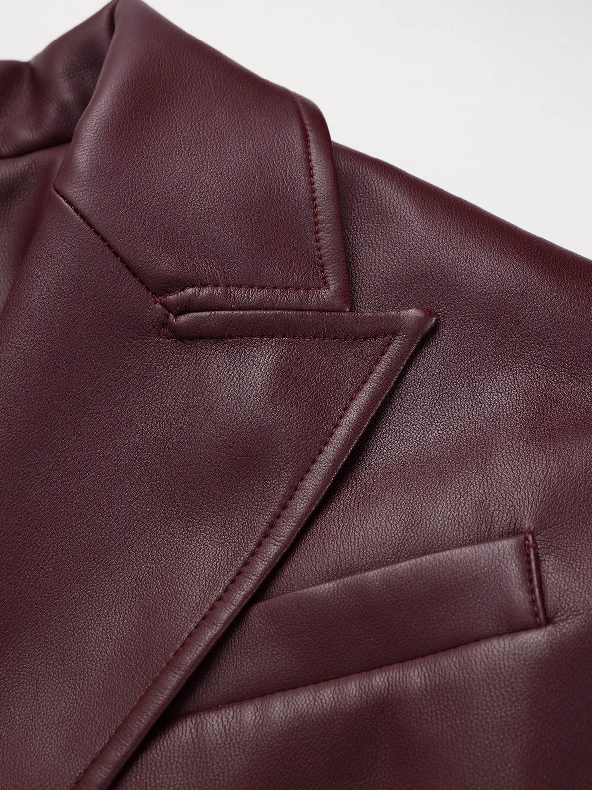 Faux Leather Jacket with Belt and Lapel Design