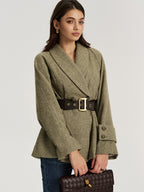 Olive green LA FINE FLEUR wool-blend shawl collar blazer with belt, styled with blue jeans.