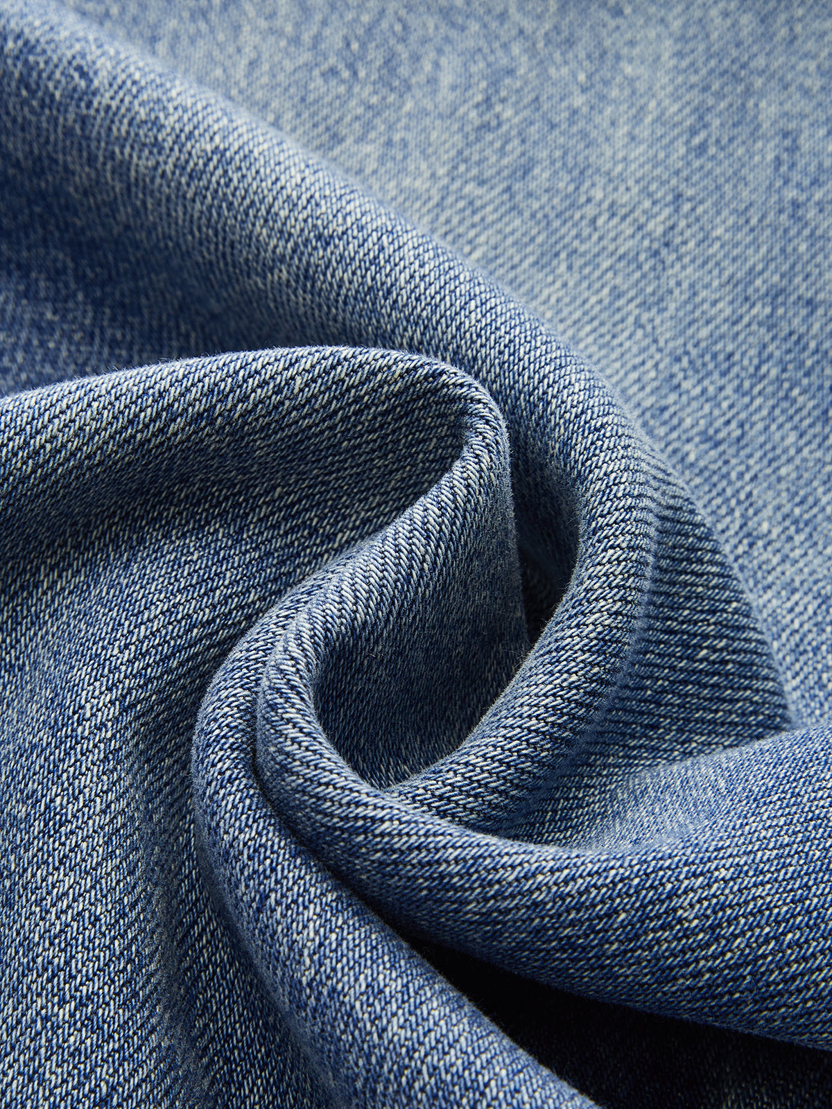 Wide-leg blue denim jeans featuring detailed woven cotton texture and natural color variations.